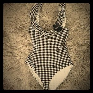 Black and white plaid body suit